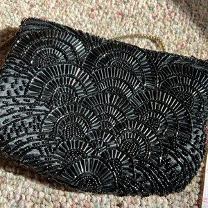 Bugle-beaded black clutch